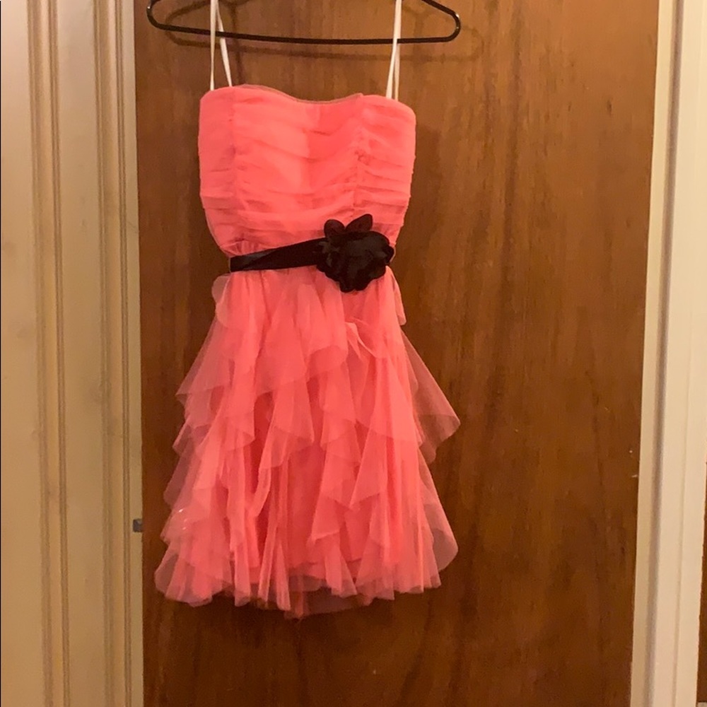 Orange dress with black sash